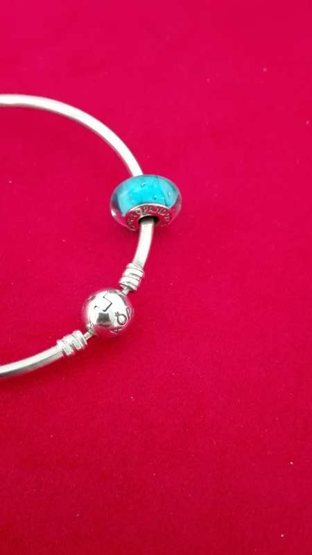 Pandora bangle with charm